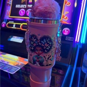 Pink Tumbler with Character Design with everything you see here
